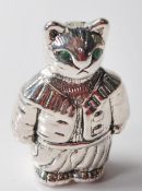 TOM KITTEN SILVER PIN CUSHION WITH GREEN EYES