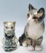 PAIR OF CONTEMPORARY CERAMIC CAT FIGURES, SIGNED A WINSTANLEY TO THE BASE.