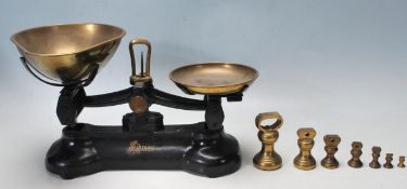 SET OF EARLY 20TH CENTURY LIBRASCO CAST IRON AND BRASS SCALES.