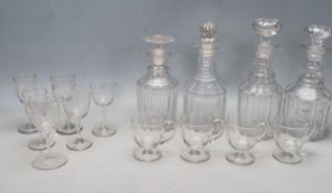 FOUR 18TH CENTURY GEORGIAN DECANTER ALONG WITH A COLLECTION OF VICTORIAN GLASSES