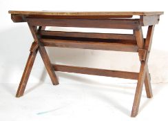 An early 20th Century vintage folding double schoo