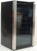 A BRUSHED STEEL AND GLASS RUSSELL HOBBS WINE COOLER