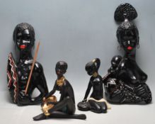 COLELCTION OF FOUR VINTAGE 1950S BLACKAMOOR DECORATIVE PLAQUES AND FIGURINES