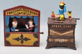 TWO VINTAGE CAST IRON MECHANICAL MONEY BANKS