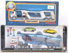 TWO VINTAGE DIECAST MODEL CAR TRANSPORTER SETS