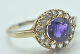 9CT GOLD AMETHYST AND WHITE STONE RING