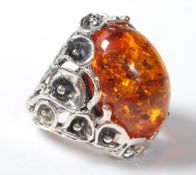 A 925 SILVER AND FAUX AMBER ART NOUVEAU STYLE DRESS RING