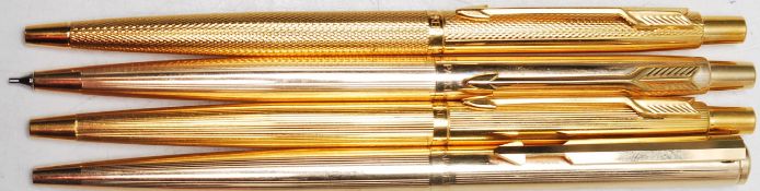 COLLECTION OF FOUR VINTAGE GOLD PLATED PARKER WRITING PENS