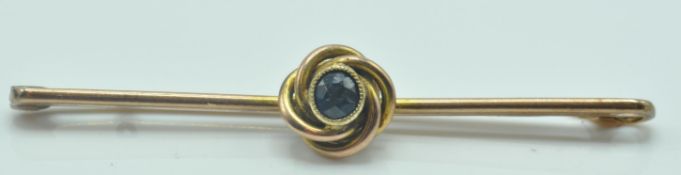 9CT GOLD AND SAPPHIRE KNIFE WORD BAR BROOCH