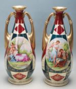 PAIR OF ROYAL VIENNA TWIN HANDLED MANTEL VASES