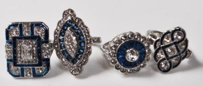 GROUP OF FOUR ART DECO STYLE RINGS