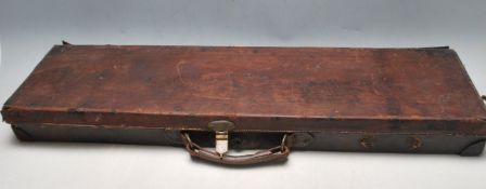LATE 19TH CENTURY VICTORIAN BROWN LEATHER GUN CASE WITH WOODEN INTERIOR