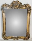 20TH CENTURY VICTORIAN STYLE GILT WALL HANGING MIRROR