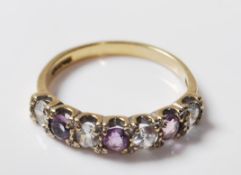 9CT GOLD AMETHYST AND WHITE STONE ETERNITY RING