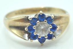 9CT GOLD RING SET WITH BLUE AND WHITE STONES