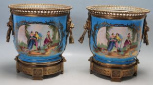 PAIR OF LARGE FRENCH SEVRES STYLE PORCELAIN JARDINIÈRES