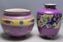 TWO EARLY 20TH CENTURY PURPLE VASES OF BALUSTER FORM
