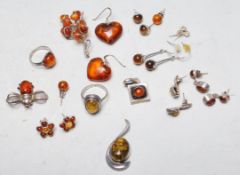 GROUP OF SILVER AND AMBER JEWELLERY