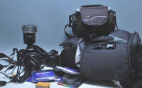 CANON EOS 450D TOGETHER WITH AN OLYMPUS STYLUS 1