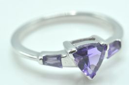 9CT WHITE GOLD AND PURPLE STONE RING