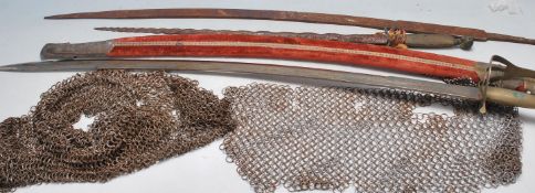 THREE 20TH CENTURY CEREMONIAL SWORDS AND A 16TH CENTURY CHAINMAIL HAT