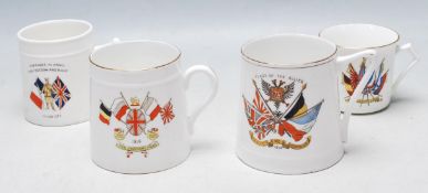 FOUR WWI COMMEMORATIVE BONE CHINA MAGS
