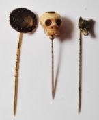 THREE 19TH CENTURY STICK PINS INCLUDING A MOURNING PIN