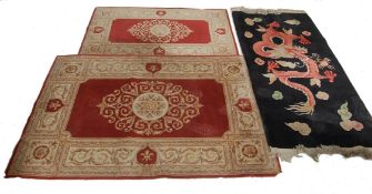 THREE 20TH CENTURY CHINESE ORIENTAL RUGS