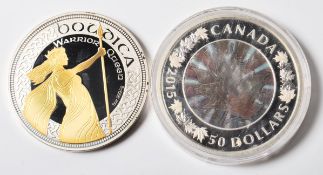 TWO 5OZ SILVER COINS