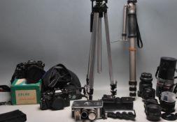 LARGE COLLECTION OF 35MM CAMERAS LENSES AND PHOTOGRAPHIC EQUIPMENT