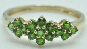 9CT GOLD AND GREEN STONES SET CLUSTER RING
