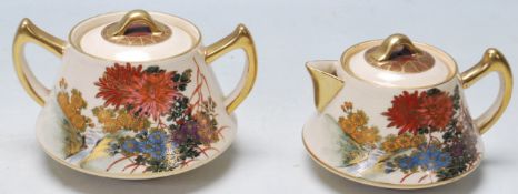AN EARLY 20TH CENTURY JAPANESE SATSUMA CERAMIC TEAPOT AND SUGARBOWL