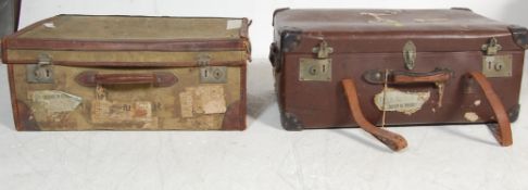 PAIR OF VINTAGE 20TH CENTURY LEATHER AND CANVAS TRUNKS.