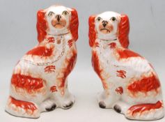 PAIR OF 19TH CENTURY VICTORIAN STAFFORDSHIRE FIRE DOGS