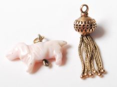 ANTIQUE TASSEL AND PINK CORAL DOG CHARM