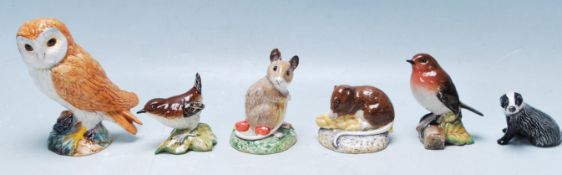 COLLECTION OF VINTAGE BESWICK FIGURES IN THE FORM OF WOODLAND ANIMALS.