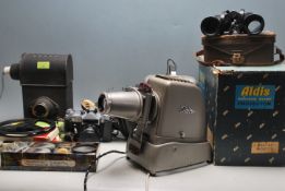 VINTAGE 20TH CENTURY SLIDE PROJECTOR AND 16MM FILM PROJECTOR