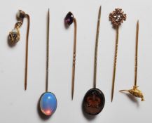 SIX ANTIQUE AND VINTAGE MIXED STICK PINS