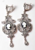 PAIR OF RENAISSANCE STYLE WHITE METAL EARRINGS