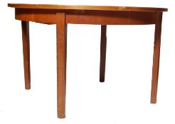 1970’S TEAK WOOD CIRCULAR EXTENDING DINING TABLE