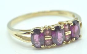 9CT GOLD PURPLE AND PINK STONE CLUSTER RING