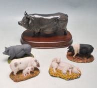 COLLECTION OF FIVE ROYAL DOULTON PIGS