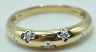 9CT GOLD AND DIAMOND RING SET WITH FIVE STONES