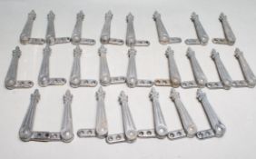 COLLECTION OF 24 ART DECO METAL CARPET CLIPS