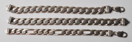 THREE SILVER FLAT LINK BRACELETS