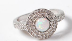 .925 SILVER LADIES DRESS RING WITH A CENTRAL OPALITE STONE.
