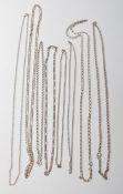 EIGHT MIXED SILVER NECKLACE CHAINS