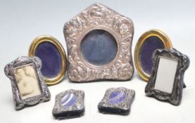 SEVEN 20TH CENTURY SILVER FRONTED PHOTO FRAMES