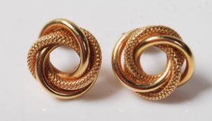 A PAIR OF 9CT GOLD KNOT EARRINGS