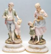 PAIR OF 20TH CENTURY BISQUE PORCELAIN FIGURINES